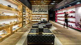 The seating back brass panels were laser cut and V-Grooved to create a return of 1/4inch depth for this Sam Edelman Californian shoe store by our US VGrooving partner Niconat.