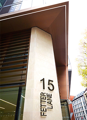 15 Fetter Lane, EC4A, London Brise Soleil, column and canopy in Chocolate PVD stainless steel V-Grooved and folded to appear as solid bronze.