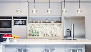 Contemporary lacquer and marble kitchen with Miele appliances